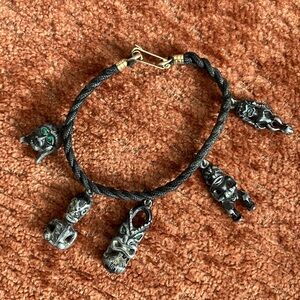 Antique Tiki Black Braided Bracelet with Silver Charms and Green Stones